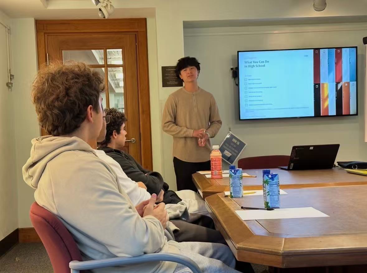 Jordan Lin presenting practical actions students can take in high school